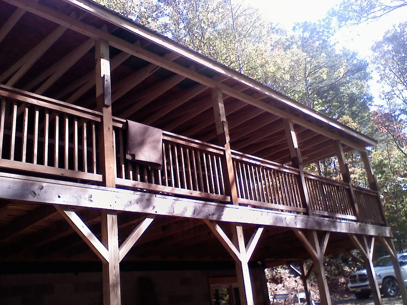 Timber framing under a new elevated porch and deck — Roof Leak Repair in Woodlawn by Roofing Brothers